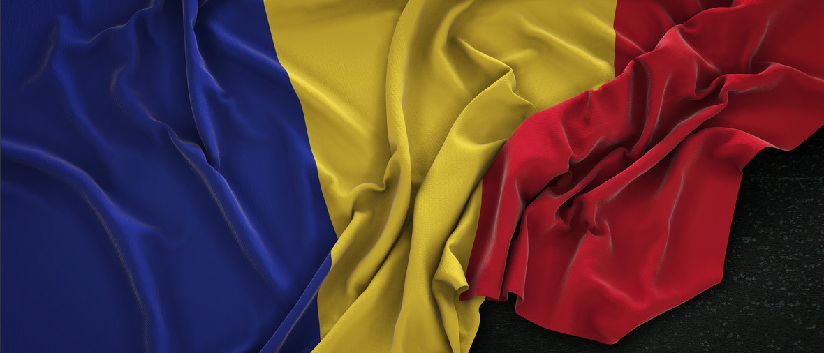 Romania Flag Wrinkled On Dark Background 3D Render