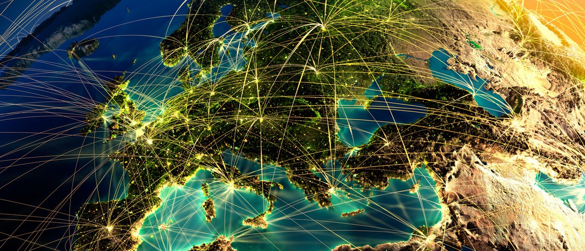 Highly detailed planet Earth at night with embossed continents, illuminated by light of cities, translucent and reflective ocean. Earth is surrounded by a luminous network, representing the major air routes based on real data